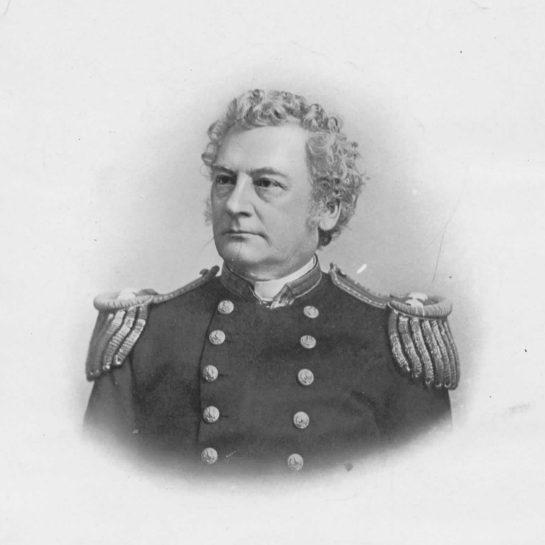 Commodore B. Franklin Isherwood USN - Black and white photo of a man with curly hair in navy uniform, photo is taken torso-up and the edges are faded