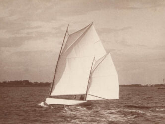 Clara. [Inscription on verso by Nathanael G. Herreshoff. The photo shows NGH and his wife Clara onboard the family cat-yawl Clara. Clara is carrying the novel batten sail which was exchanged against a more conventional gaff sail on August 25, 1890.]