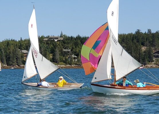The North Haven Casino has run “Foxeye” races for many years. In this photo, #11, skippered by Missy Janes with crew Jenny DuPont, chases #620, sailed by Steve (skipper) and Elvire Wolfram.